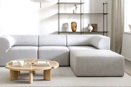 Living room with modern wall art and framed prints, creating a stylish and vibrant focal point. Creative Living Room Wall Decor Ideas to Transform Your Space