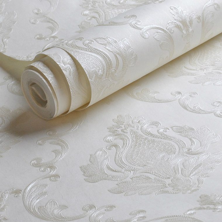 Detail shot of white textured wallpaper highlighting its durable material and stylish texture, ideal for lasting elegance in any space.