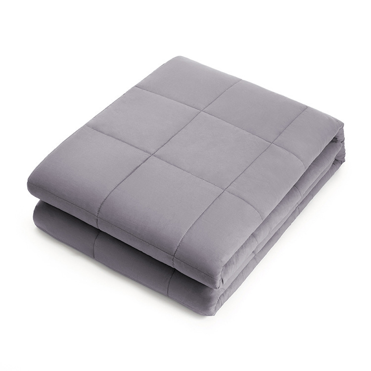 Lightweight Cotton Twin XL Blanket displayed on a bed, showcasing its soft, breathable cotton fabric.