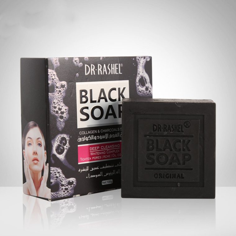 Organic black soap with activated charcoal and bamboo, displayed on a wooden soap dish, highlighting its natural ingredients and eco-friendly appeal.